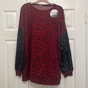Women’s Long Sleeve Leopard Print Blouse with Sequin Sleeves.